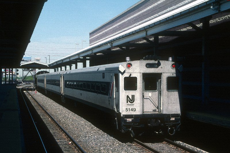 19890446-njt.jpg - May 22, 1999:  NJT train 4611 is serviced at the Atlantic City Rail Terminal.  Comet-II cab car 5149 along with two Comet-II coaches was a typical consist around the turn of the century.  Trains now generally have four cars of newer cars.