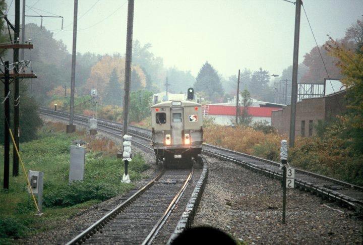 fp1.jpg - Age caught up with the bullet cars before replacement cars could be ordered, resulting in SEPTA having to find substitute cars for the Norristown line service.  Here a retrucked Market-Frankford "Almond Joy" car approaches Wynnewood Road en route 69th St. Terminal.