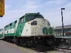 A GO Transit EMD F59PH locomotive rests at Oshawa, Ontario on the Lakeshore line. It will soon push the train back to Toronto and points west of there.