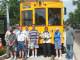 Group poses in front of TECO car at Centennial Park endpoint station.