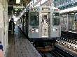 Brown Line train towards Kimball pauses at State/Lake station in the Loop