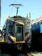 Rear of METRA Electric train in shadows at Blue Island