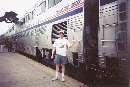 Kevin poses outside the SUNSET LIMITED dining car while the train paused at the Jacksonville station