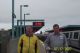 Mike & Steve (& Lynn behind the camera) at West Oakland BART station await train carrying the rest of the group.