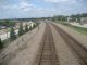 OTOL group begins "new" trackage as Train #5 passes Aurora METRA station.