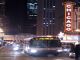 CTA bus passing the Chicago Theatre