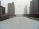 In a sight to cool anyone off, we see this view of the Chicago River iced over.