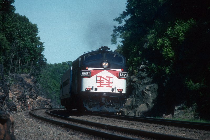 19930870-sle.jpg - Shore Line East train 3634 pushing east near MP83.5 in Branford, CT. June 25, 1993