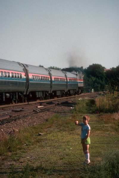 19930893-amtk.jpg - The photographer's son counts the cars of Amtrak train 177 at Fort Yard, in New London, CT. July 5, 1993