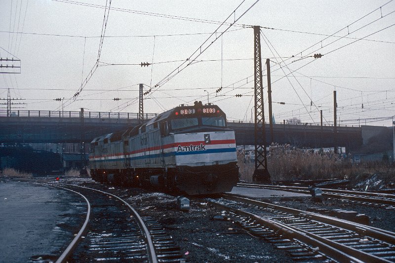 19820536-amtk.jpg - Amtrak F40s #303 and #200 prepare to couple up to train 292 at New Haven, CT, for the remained of the New England Metroliner journey to Boston. December 23, 1982.